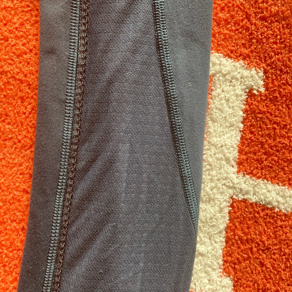 Lululemon Athletica teal Leggings with sheer detail on outer leg